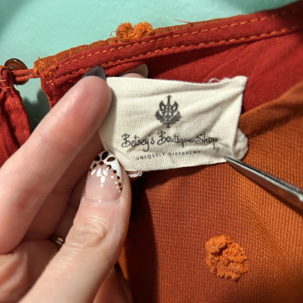 Textured Ruffle-Sleeve Blouse in Rust Orange - Picture 3 of 4